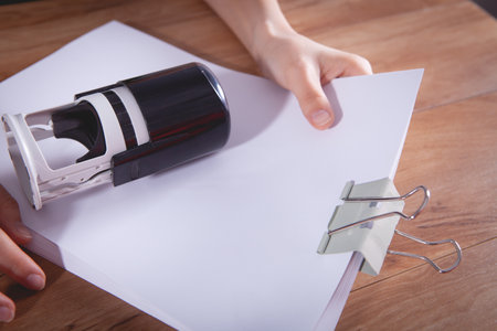 leaves woman stamp on paperの写真素材