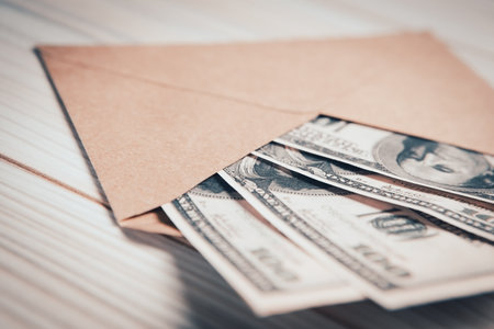 dollar bills in an envelope