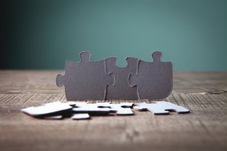 puzzle pieces on a blue backgroundの写真素材