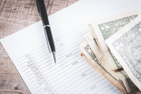 Close up calculator and financial report - accounting concept