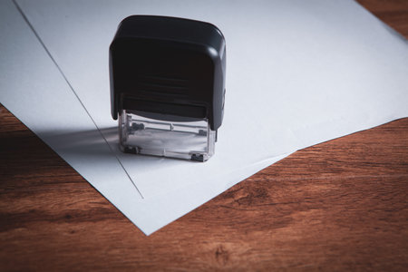 put a stamp on business contract in office