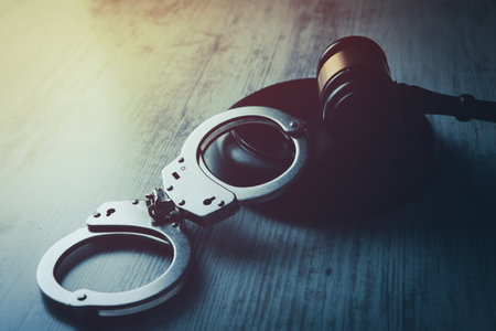 Legal law concept image - gavel and handcuffsの写真素材
