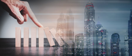 cube blocks stop falling blocks on table.の写真素材