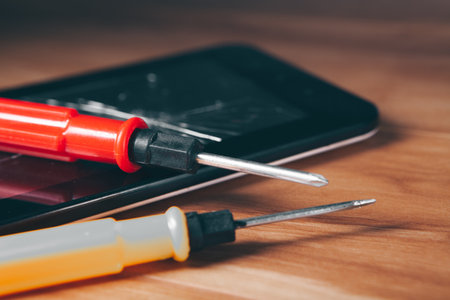 screwdrivers on the broken tabletの写真素材