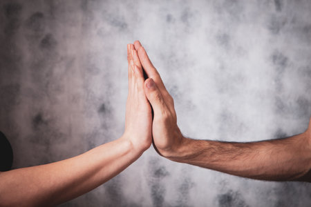 girl and boy holding each other's hands