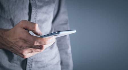 man using his mobile phoneの写真素材