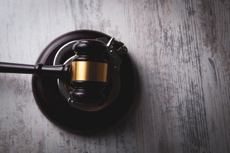 Legal law concept image - gavel and handcuffsの写真素材