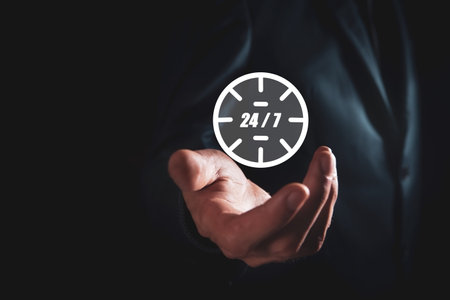 24/7 24 hour service clock.の写真素材