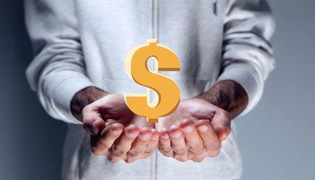 businessman holding sign dollar signの写真素材