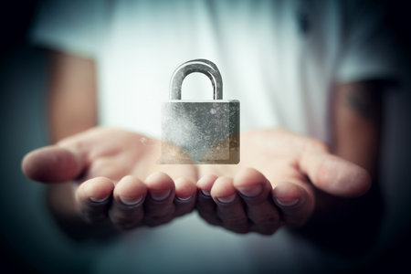 man holding lock in his hand