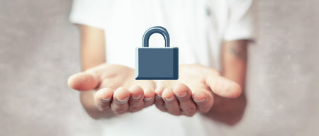 man holding lock in his hand