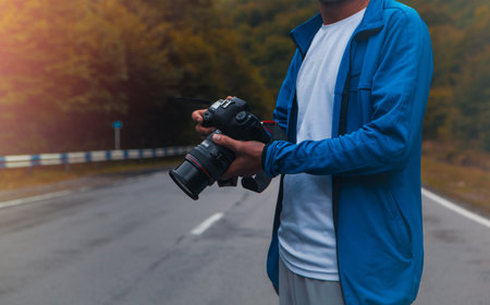 young man with a camera