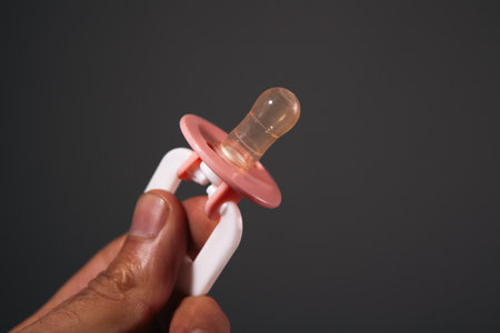 a closeup shot of a red and pink sootherの写真素材