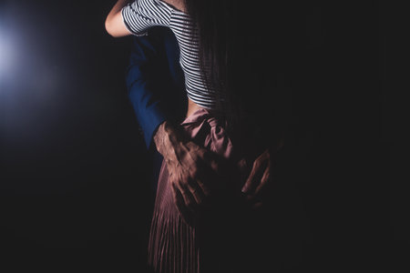 couple hugging tightly and passionately