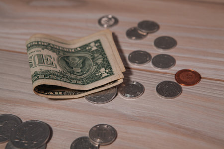a lot of money on wooden tableの写真素材
