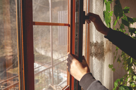 young man with a brush in the hands of a manの写真素材