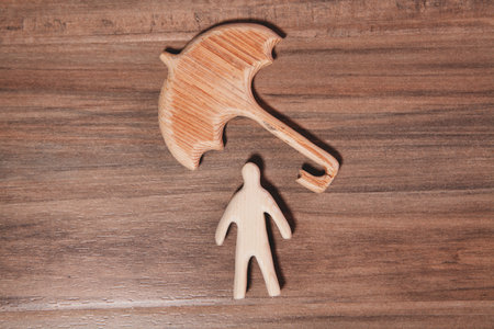 wooden model of car and toy car on white backgroundの写真素材