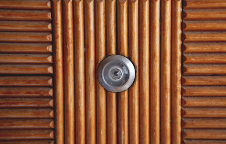 close up of old wooden door with metal handleの写真素材