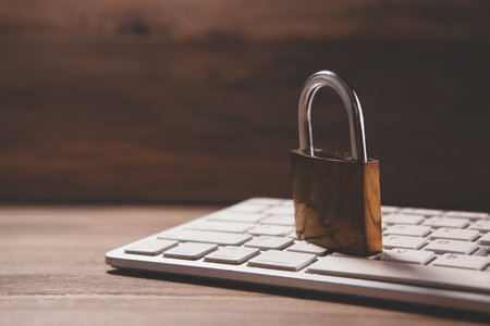 padlock and laptop with copy space
