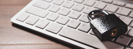 padlock and laptop with copy space