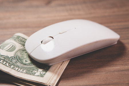 one dollar bills and a mouseの写真素材