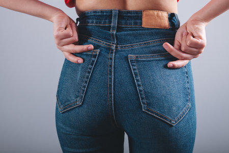 woman posing in jeansの写真素材