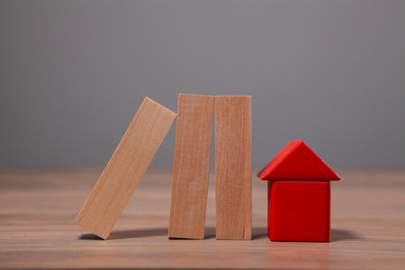 wooden toy house with wooden blocks.の写真素材