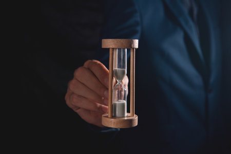businessman with hourglass in hand