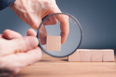 businessman with wooden blocks..