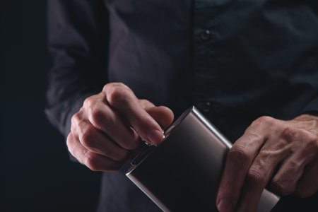 cropped image of young bearded man holding digital tabletの写真素材