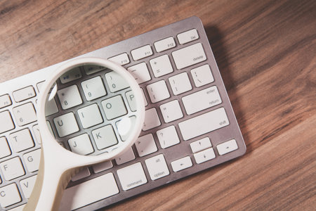 keyboard and mouse on wooden table