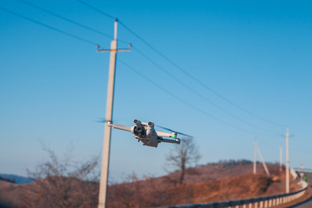 flying drone with camera on the mountain.の写真素材