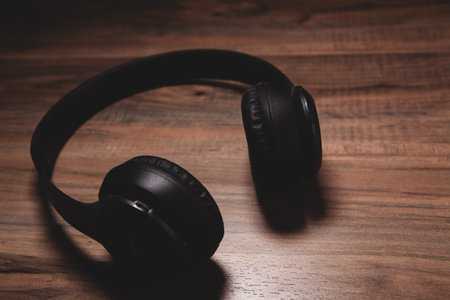 headphones on wooden backgroundの写真素材