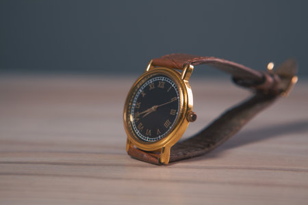 watch on wooden table, close upの写真素材