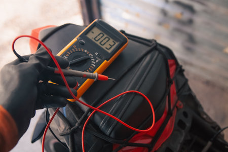 electrician check motorcycle wiring with tester
