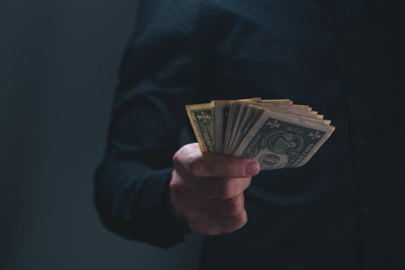 businessman with money in handの写真素材