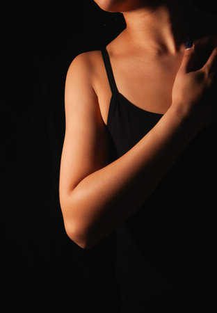 woman in black dress posingの写真素材