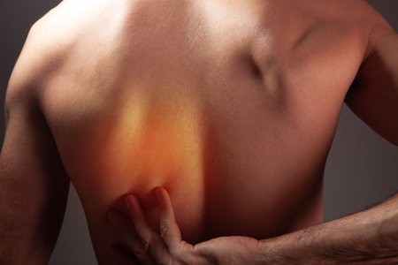 man suffering from backpain..の写真素材