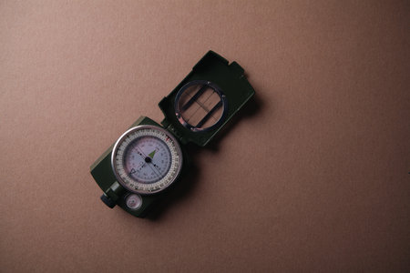 vintage military compass on a light gray backgroundの写真素材