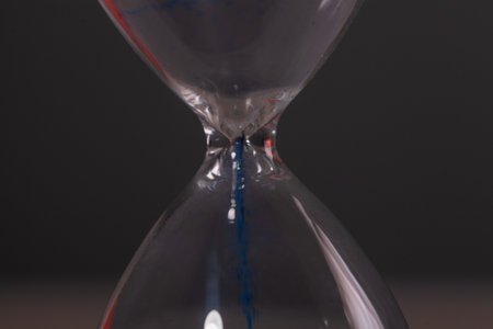 hourglass on black background..