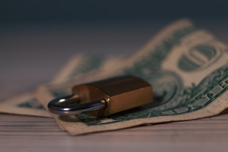 dollar banknotes and key on a wooden backgroundの写真素材