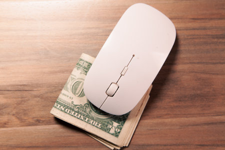 computer mouse and money work onlineの写真素材