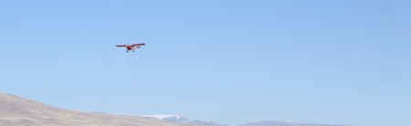 flying plane in the mountains