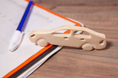 car toy with wooden block and wooden model.の写真素材