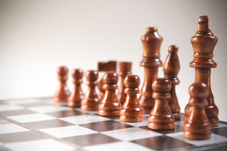 Chess pieces on a chessboard, shallow depth of field.の写真素材