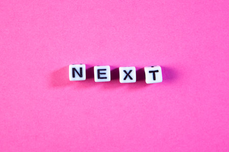 word new exit on an abstract pink background, business and finance conceptの写真素材