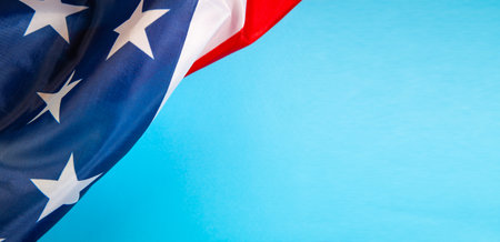 American flag on blue background with copy space for text or image.の写真素材