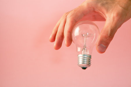 hand holding a bulb business ideaの写真素材