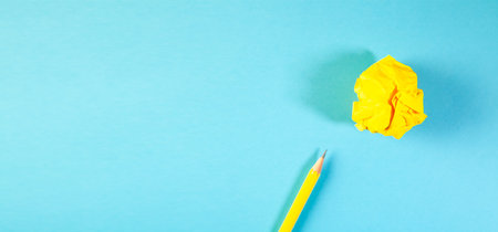 yellow flower on a blue background. the concept of the spring seasonの写真素材