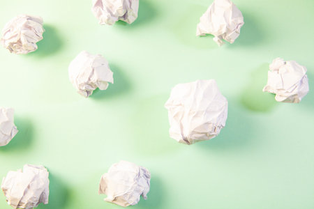 creative background of crumpled white paper balls.の写真素材